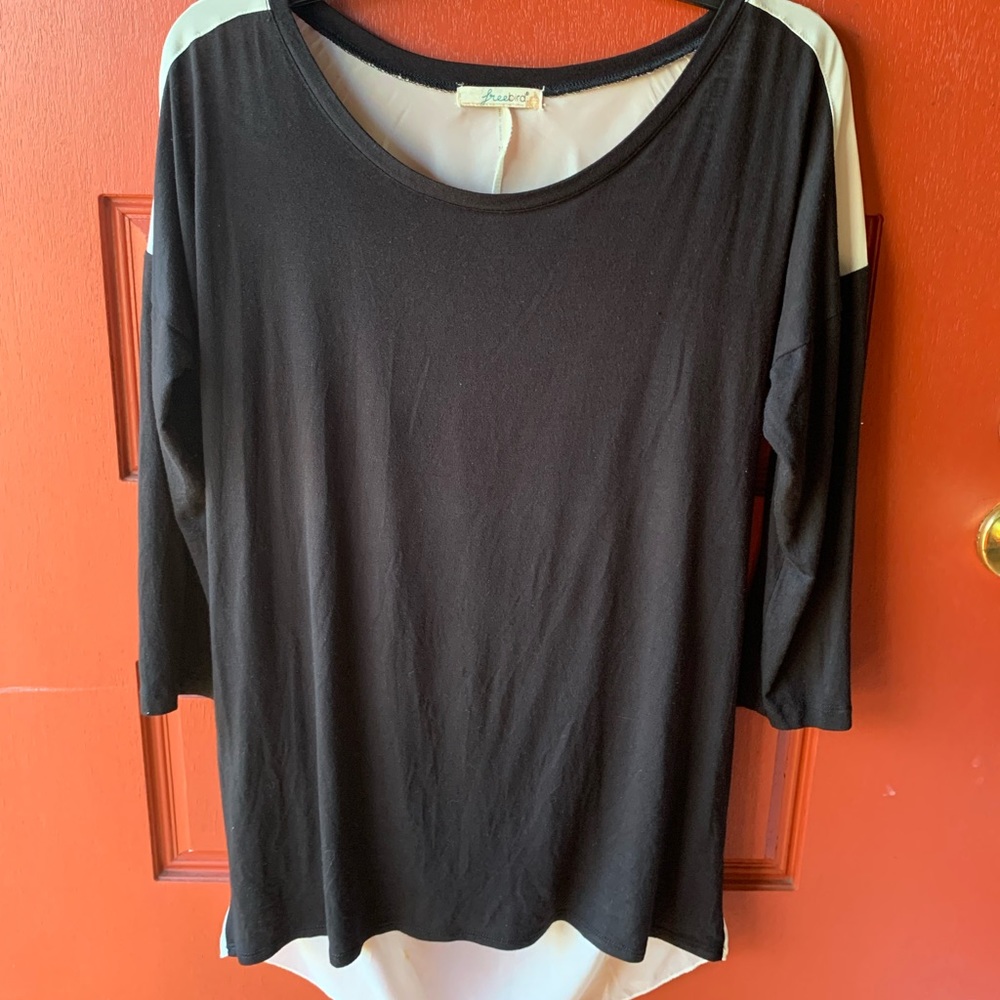 Black top with white sheer back